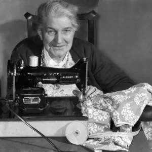 A very happy Mrs. Emms with her new Singer Sewing machine presented to her by the Daily