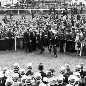 Hard Ridden with jockey Charlie Smirke after winning The Derby in the winners enclosure Hard Ridden with jockey Charlie Smirke after winning The Derby in the winners enclosure
