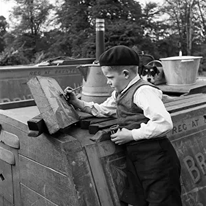 Harold Collins, age 8, of the canal boat "Whitley and Bayswater"