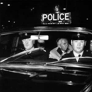 Harold Wilson British Prime Minister is driven back to Downing Street in a police car