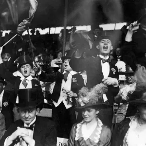 Harrovians cheer their team on during the annual Schools Day match between Eton Harrovians cheer their team on during the annual Schools Day match between Eton