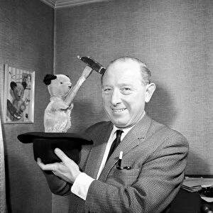 Harry Corbett at home with Sooty. 1960 A1224-011
