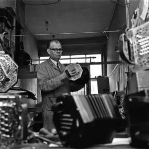 Harry Crabb seen here making concertinas in his workshop at Liverpool Street Harry Crabb seen here making concertinas in his workshop at Liverpool Street