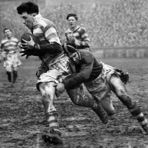Harry Street of Wigan being tackled print from a 1954 Rugby League match Harry Street of Wigan being tackled print from a 1954 Rugby League match