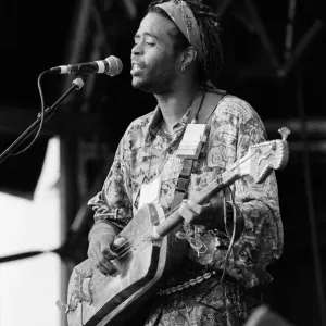 Hassan Hakmoun performing at WOMAD festival at Rivermead in Reading, Berkshire Hassan Hakmoun performing at WOMAD festival at Rivermead in Reading, Berkshire