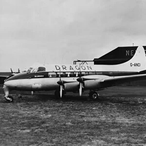 A de Havilland Heron propeller-driven small airliner operated by Dragon Airways