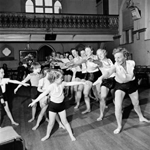 Health and Beauty: Wimbledon mothers and their children keep fit at the local church hall