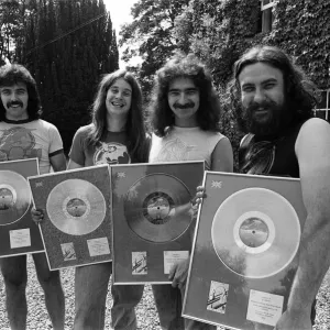 Heavy Metal group Black Sabbath pictured with the silver discs they received for Heavy Metal group Black Sabbath pictured with the silver discs they received for
