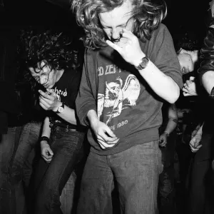 Heavy Metal music fans enjoying a night out. 1981 Heavy Metal music fans enjoying a night out. 1981