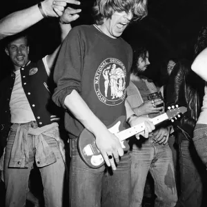 Heavy Metal music fans enjoying a night out. 1981 Heavy Metal music fans enjoying a night out. 1981