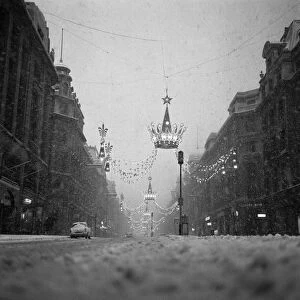The heavy snowfall on New Years Eve leave Londons Regent Street near deserted of