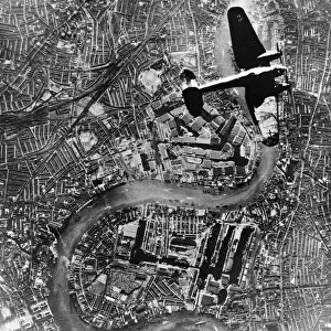 A Heinkel 111 bomber aircraft of the German Luftwaffe flies over Tower Bridge