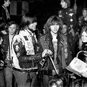 Hells Angels youth pose for a mock wedding by bikes 1969