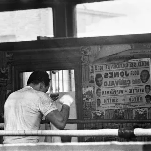 Henry Cooper in the gym training ahead of his second with Muhammad Ali Henry Cooper in the gym training ahead of his second with Muhammad Ali