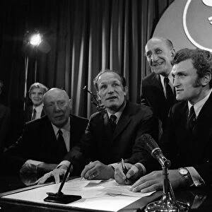 Henry Cooper and Joe Bugner sign to meet for the British Heavyweight crown on March 16th