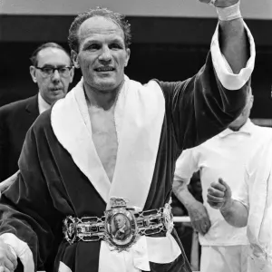 Henry Cooper receiving the Lonsdale belt after his win in the fight against Jack Bodell Henry Cooper receiving the Lonsdale belt after his win in the fight against Jack Bodell