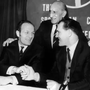 Henry Cooper shakes hands with Jack Bodell January 1970 after signing up for Henry Cooper shakes hands with Jack Bodell January 1970 after signing up for