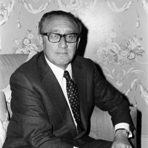 Henry Kissinger at a press conference, answering questions about his latest book Henry Kissinger at a press conference, answering questions about his latest book