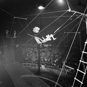 High in the big top, 60 feet above a hushed audience at Billy Smart High in the big top, 60 feet above a hushed audience at Billy Smart
