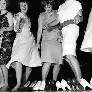 High heels discard as the girls join in the high jinks at the Locarno in Glasgow