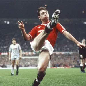 A high kick from Brian McClair. Manchester United 1-1 Liverpool A high kick from Brian McClair. Manchester United 1-1 Liverpool