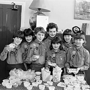 Highburton Guides are pictured with home made sweets at a coffee morning which raised