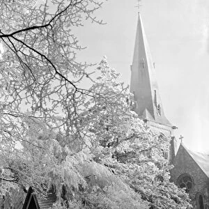 A hoare frost clings to the trees close to the church at High Beech Hertfordshire