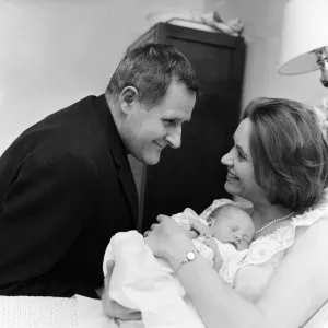 Holding her 12-hour old baby is stage and TV actress Lillias Walker Holding her 12-hour old baby is stage and TV actress Lillias Walker