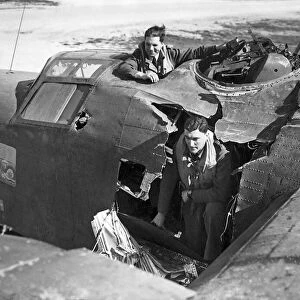 A hole in a USAF Consolidated Liberator B25 bomber after bombing mission over