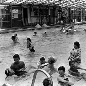Holiday makers enjoy the Swimming Pool at the Sun Centre, Trecco Bay, Porthcawl, Bridgend