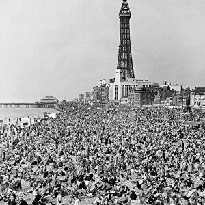 Holidaymakers enjoy the hot weather during the Easter break in Blackpool, Lancashire
