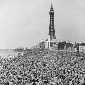 Holidaymakers enjoy the hot weather during the Easter break in Blackpool, Lancashire