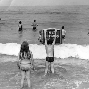 Holidaymakers risk their lives by ignoring the NO BATHING signs at this North East beach