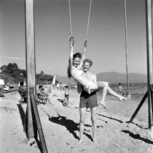 Holidays: Couples enjoying the beach on Corsica. August 1957 A503a-001