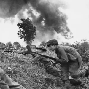 Holland: The Battle for Hertogenbosch. British troops advancing along a ditch Holland: The Battle for Hertogenbosch. British troops advancing along a ditch