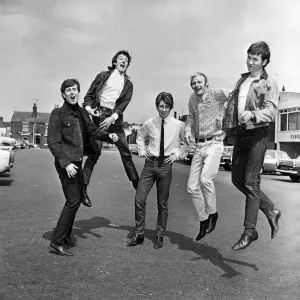 The Hollies pop group in happy mood in Stockport after hearing news that their latest