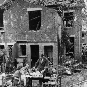 Print of a family's resilience amidst wartime destruction
