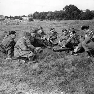 A Home Guard camp near Cardiff, Wales. N. C. O gives a lesson on the Lewis gun