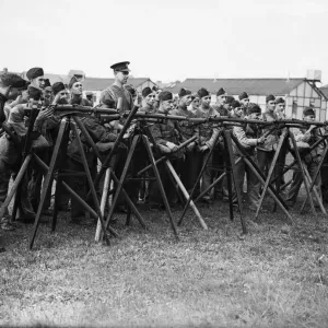 Home Guard being given instruction in the Enfield Rifle whilst on training Home Guard being given instruction in the Enfield Rifle whilst on training