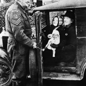 Home guard helping the residents of Slapton during the evacuation Home guard helping the residents of Slapton during the evacuation