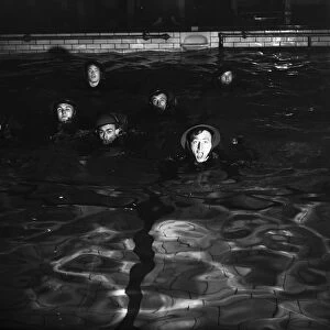 Home Guard seen here in the swimming pool fully clothed during training and manoeuvres