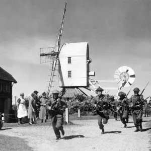 Home Guard volunteers run through a training exercise in the Suffolk village of Home Guard volunteers run through a training exercise in the Suffolk village of