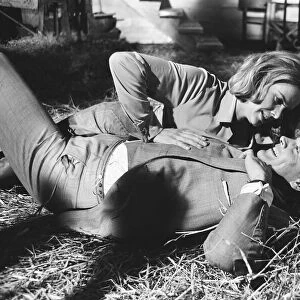 Honor Blackman as Pussy Galore and Sean Connery as James Bond seen here filming a fight