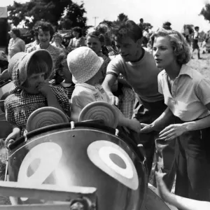 Honor Blackman and Richard Burton in a fairground Honor Blackman and Richard Burton in a fairground