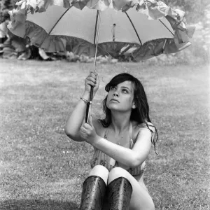 Hoping for a spot of rain to take her mind off the heatwave, this young lady, Jody