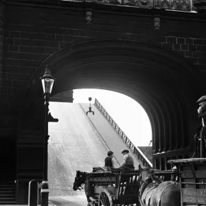 Horse drawn carts wait whilst Tower Bridge is raised Circa August 1936 Horse drawn carts wait whilst Tower Bridge is raised Circa August 1936