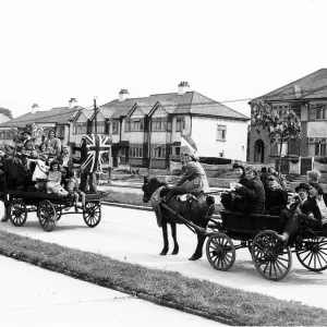 Horses and carts being driven through Southend as part of the WW2 VE Day celebrations