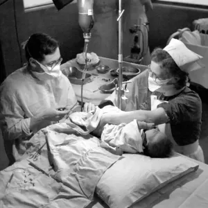 Hospital operation hearts. Babys life saved by blood transfusion. October 1946 O5112-002