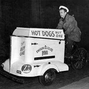 Hot-dog stands on tricycles tour Manchester at night and attend many outdoor events