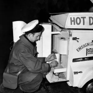 Hot-dog stands on tricycles tour Manchester at night and attend many outdoor events